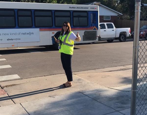 Marti Rosenberg, current Learn to Lead resident, directing traffic on the first day of school.  